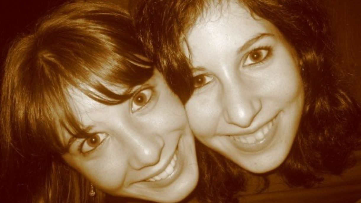 Duygu and Inci Atrek ’10 smiling and cheek to cheek