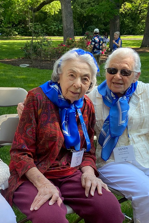 Three women from the class of 1949 sit together on Wellesley’s campus.