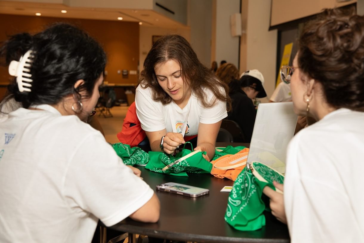Students sew bandanas