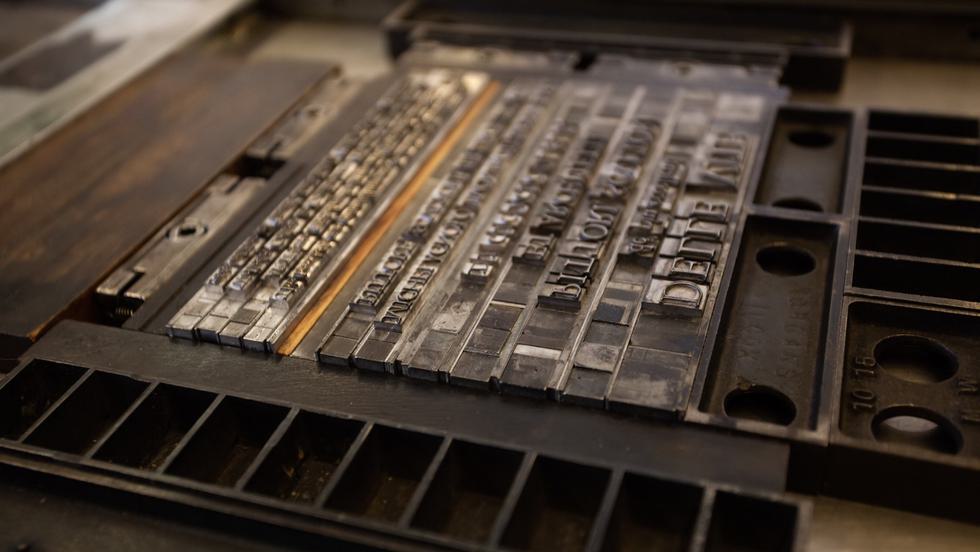 Metal type, set for printing with a press