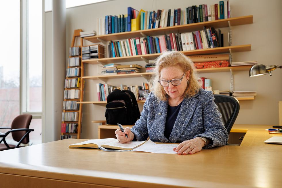 Professor Claire Fontijn works at her office.