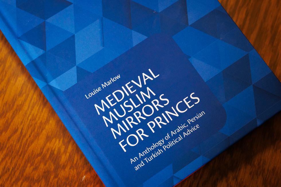 Blue geometric book cover with title, "Medieval Muslim Mirrors for Princes."
