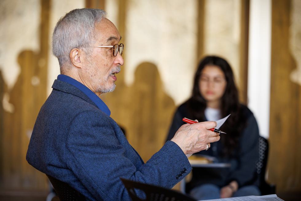 James Kodera speaks while seated.