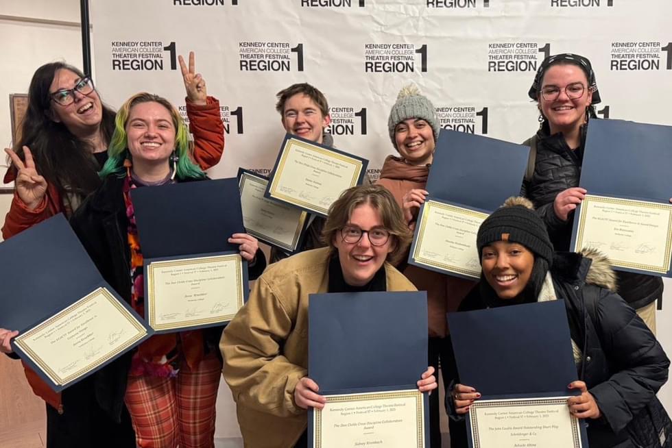 Theatre studies students posing with award certificates