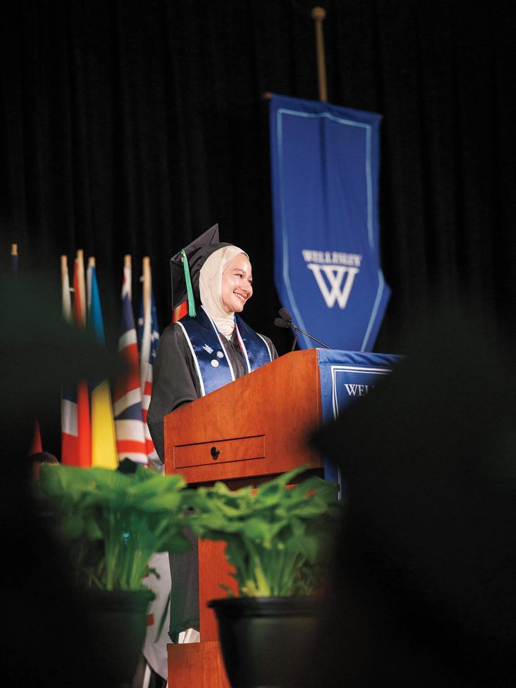 Photo of Nehal Farghaly ’25 delivering the student address