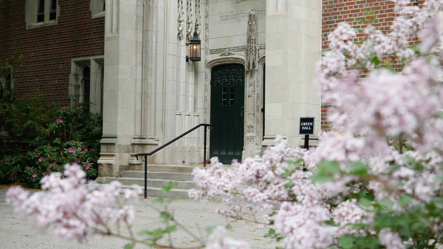 Main entrance into Green Hall with pink flowers