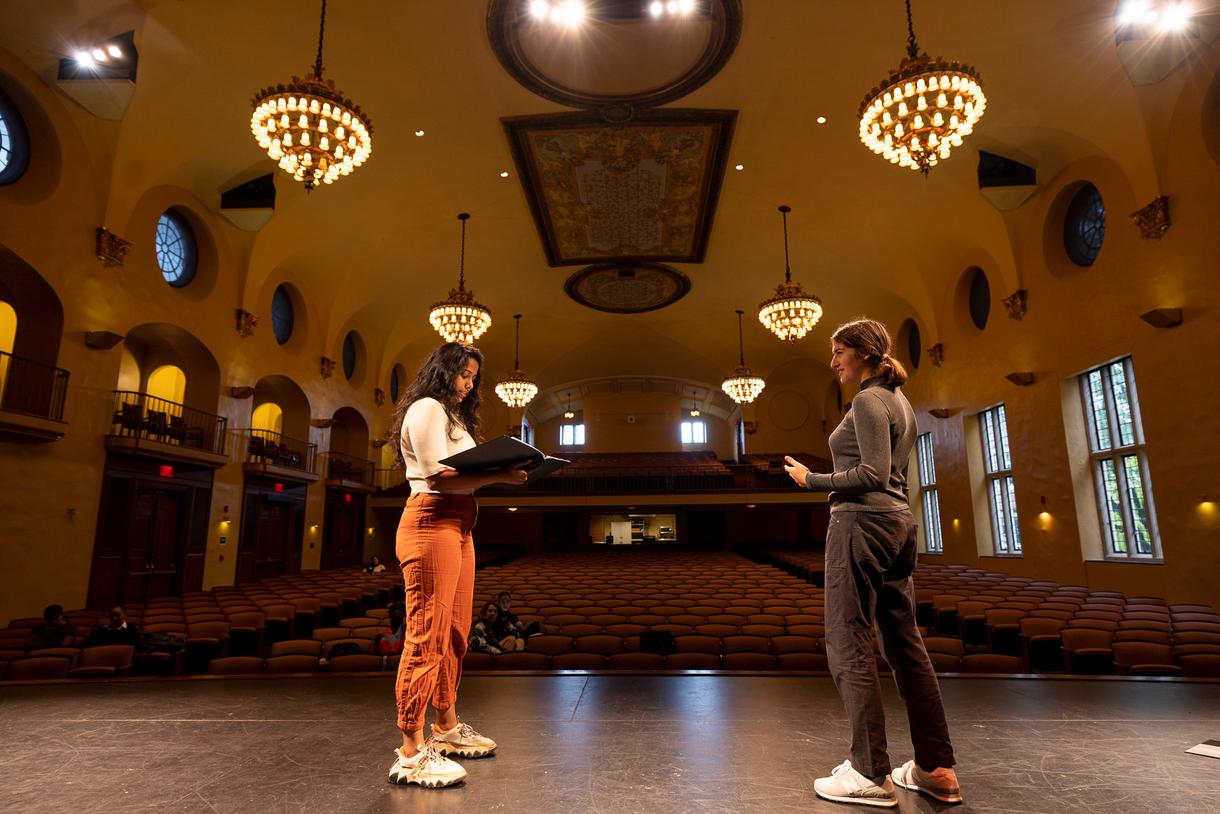 Two students on stage in an acting class