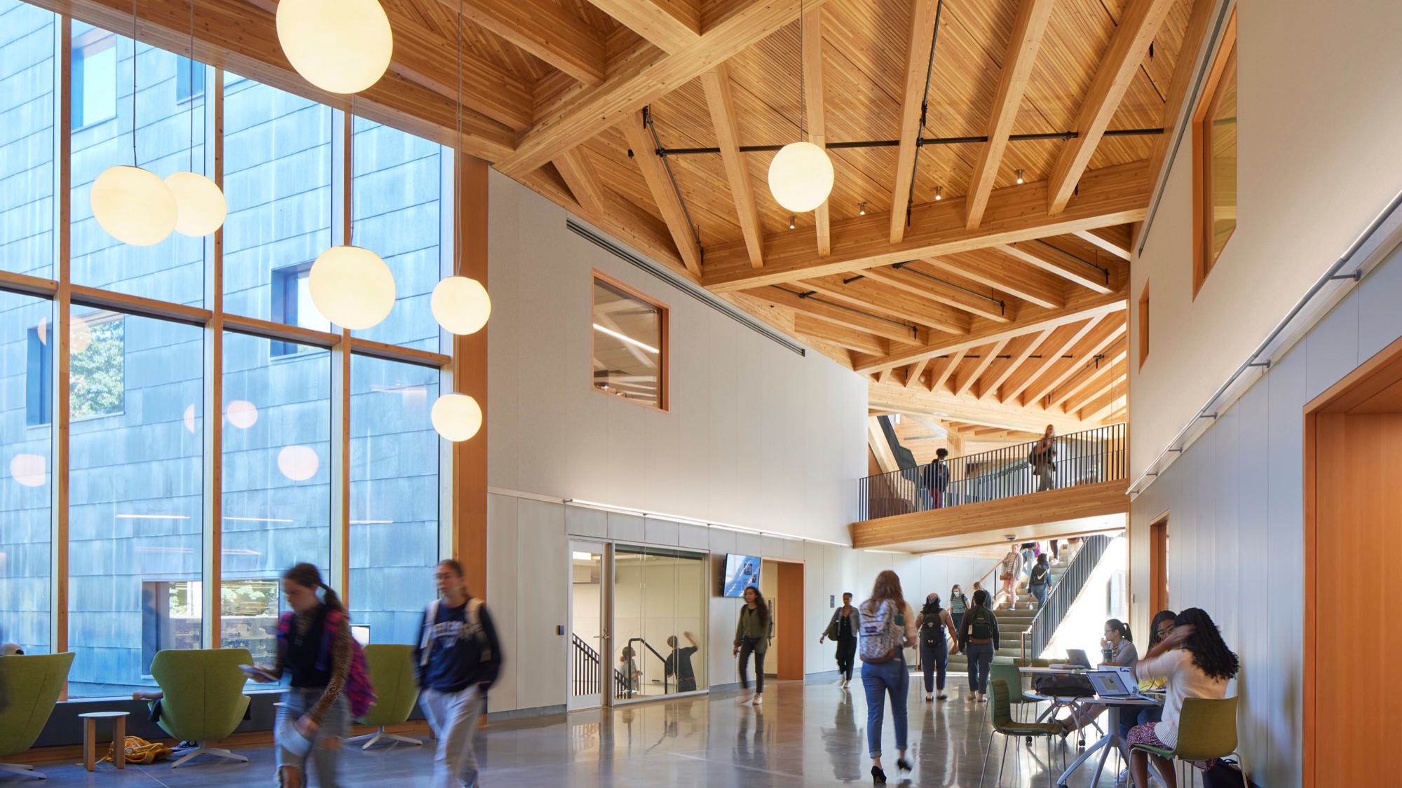 Students walking through the Science Center Focus/Innovation Hub area.