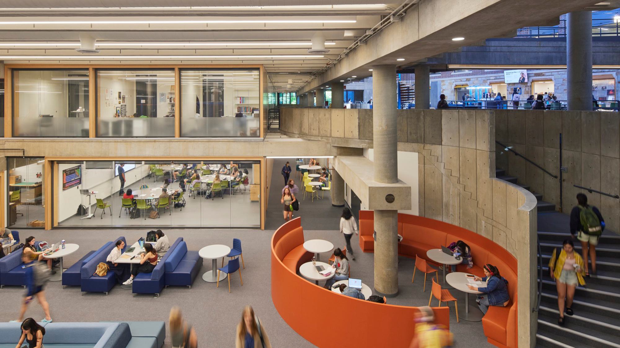 Overhead view of the Data Lounge and part of the Leaky Beaker area as students mill about.