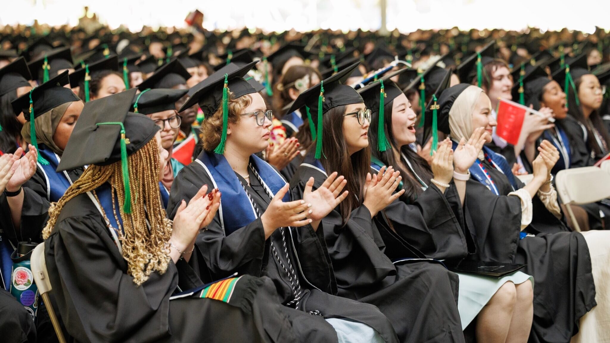 students clapping