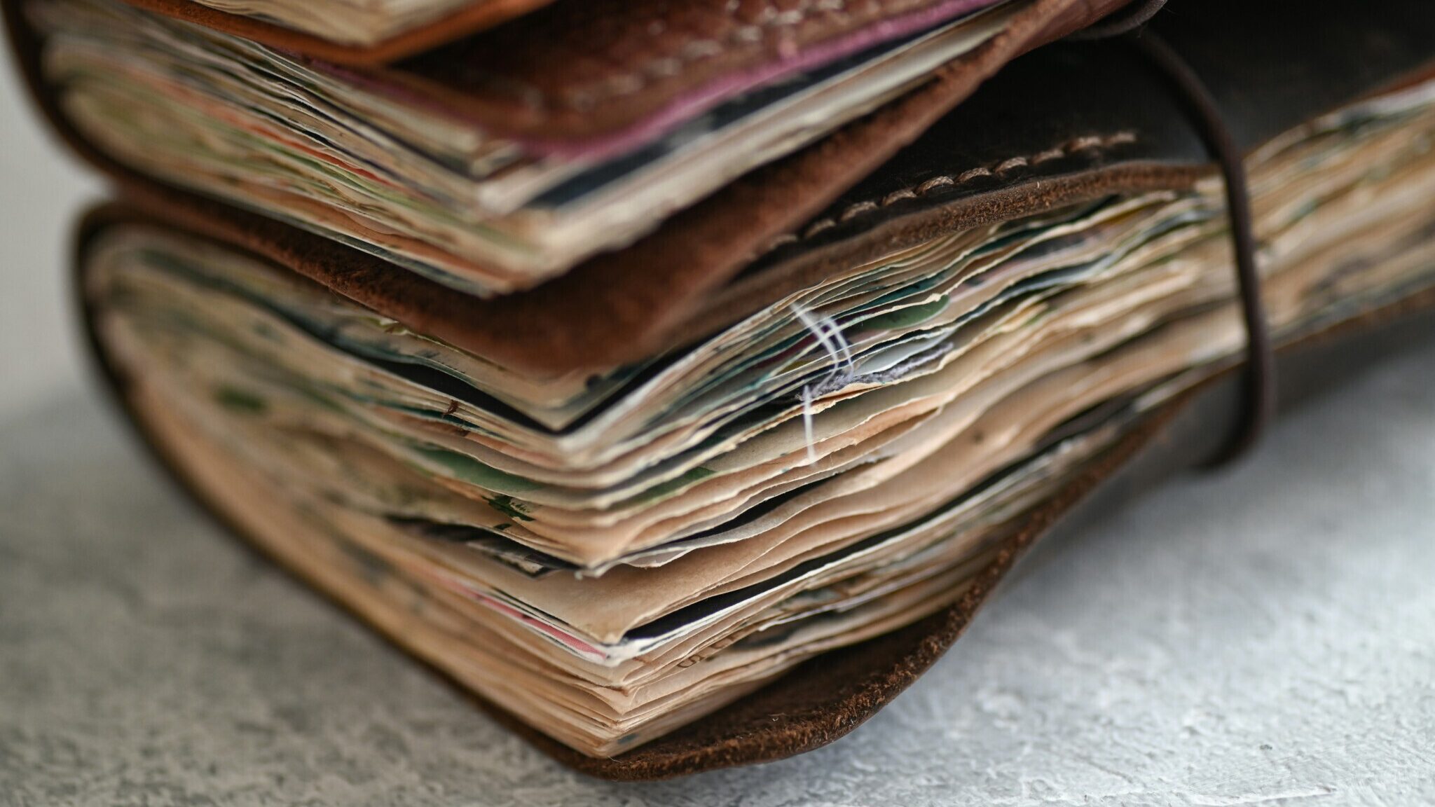 Close-up of leather-bound journals