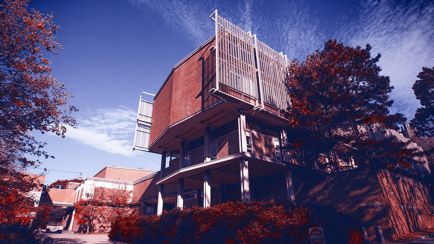 blue and red photo of the west side of the Jewett Arts Center