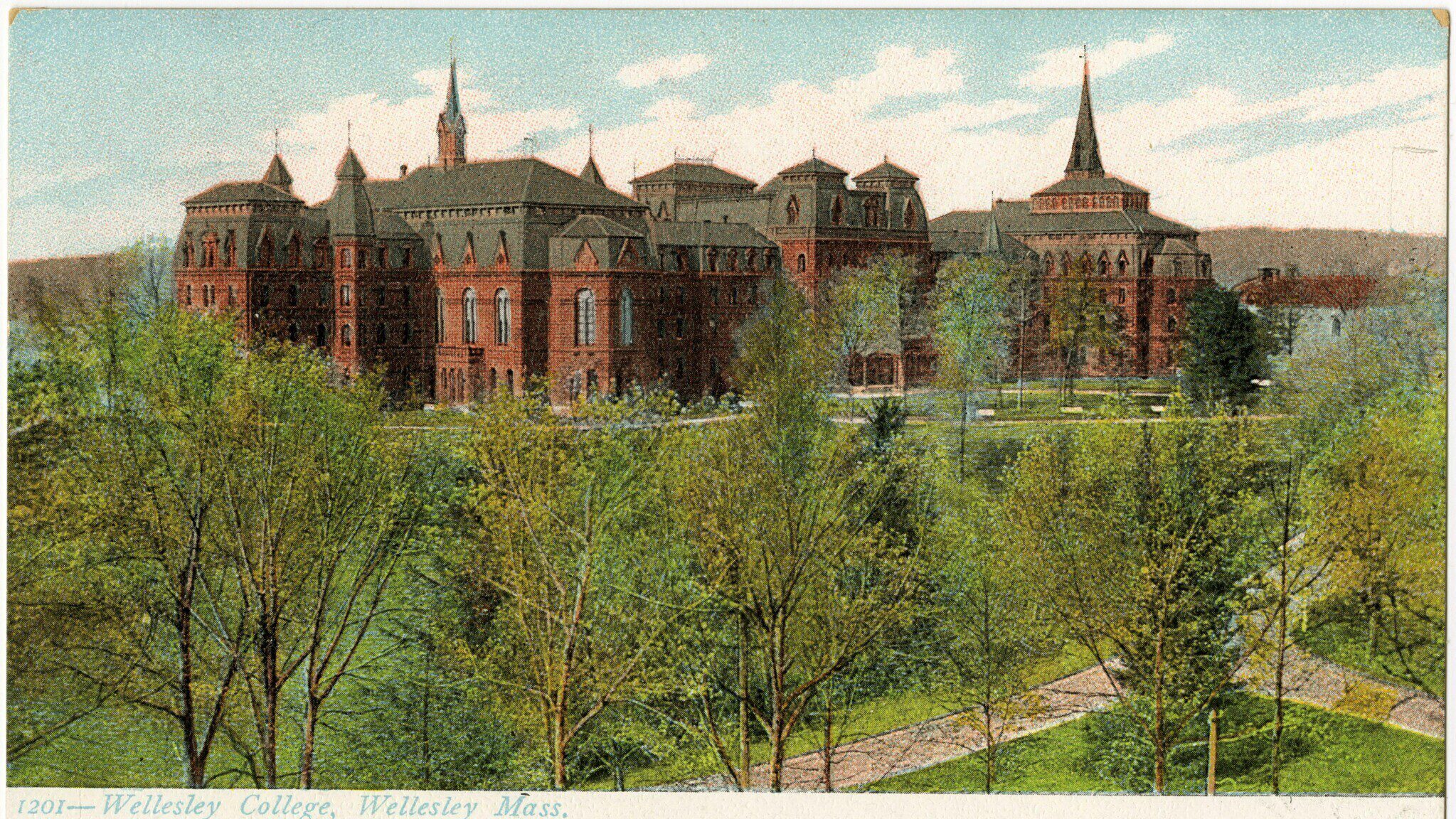 colorized postcard of red brick building with black roof surrounded by lush trees and blue sky