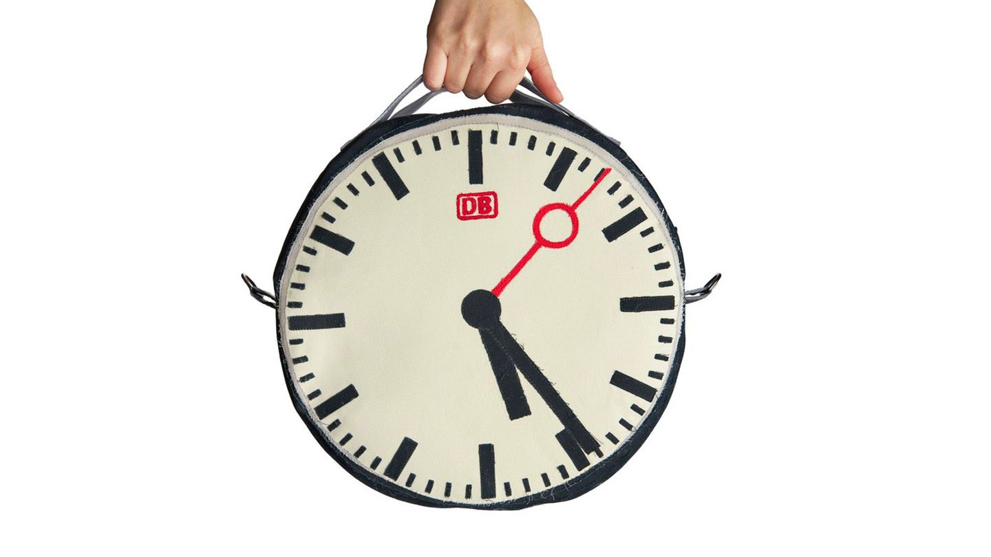 handbag sewn to look like a round clock