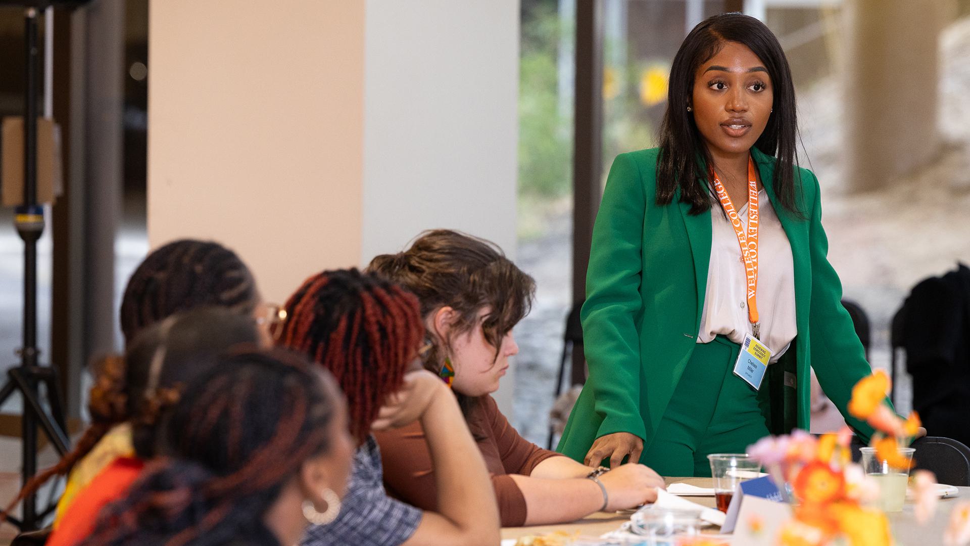 Chelsea Miller speaks to students during the summit