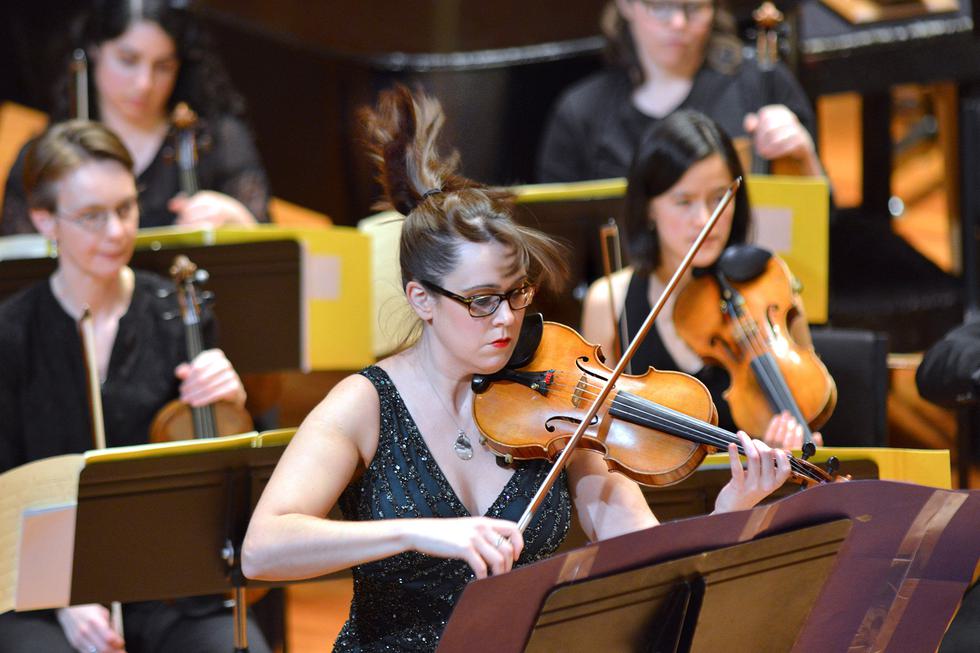 An action shot of Gabriela Diaz performing.