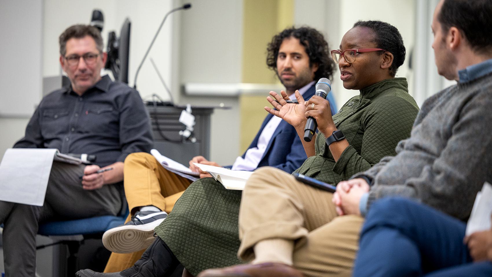 Africana studies professor Chipo Dendere (center) spoke during the Wellesley in a World of Democratic Challenges panel.