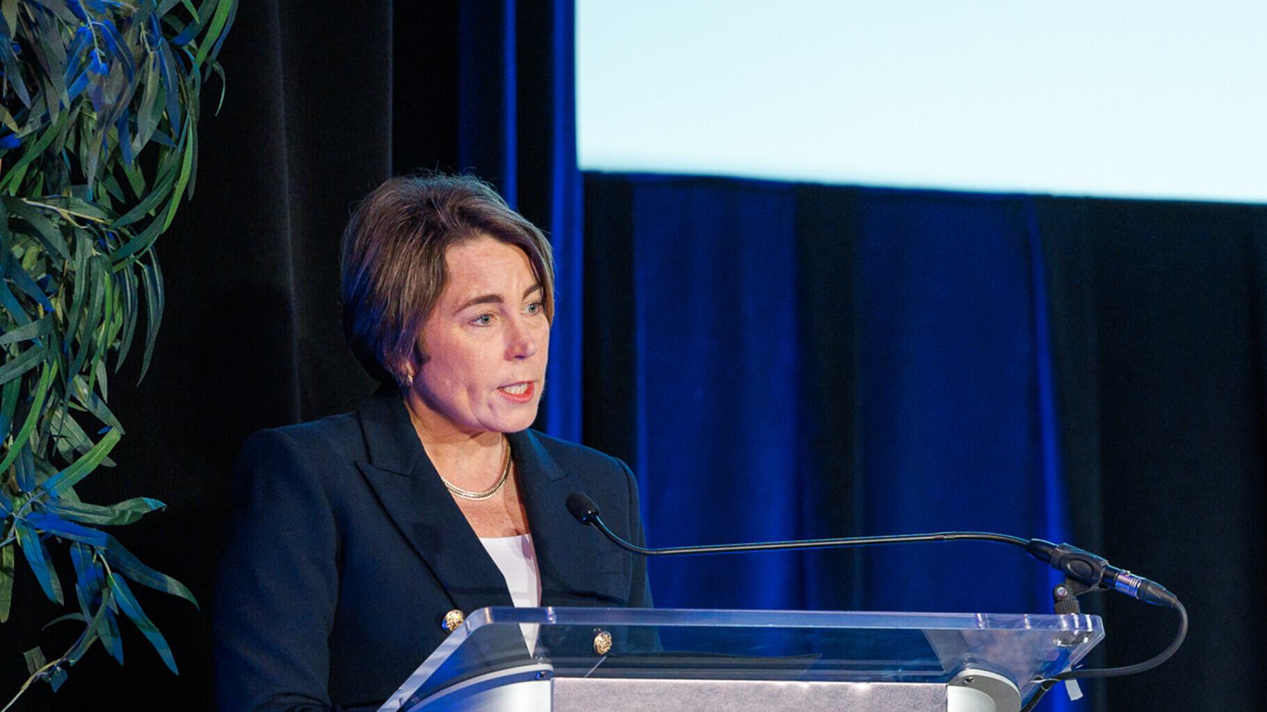 Governor Maura Healey at the podium.