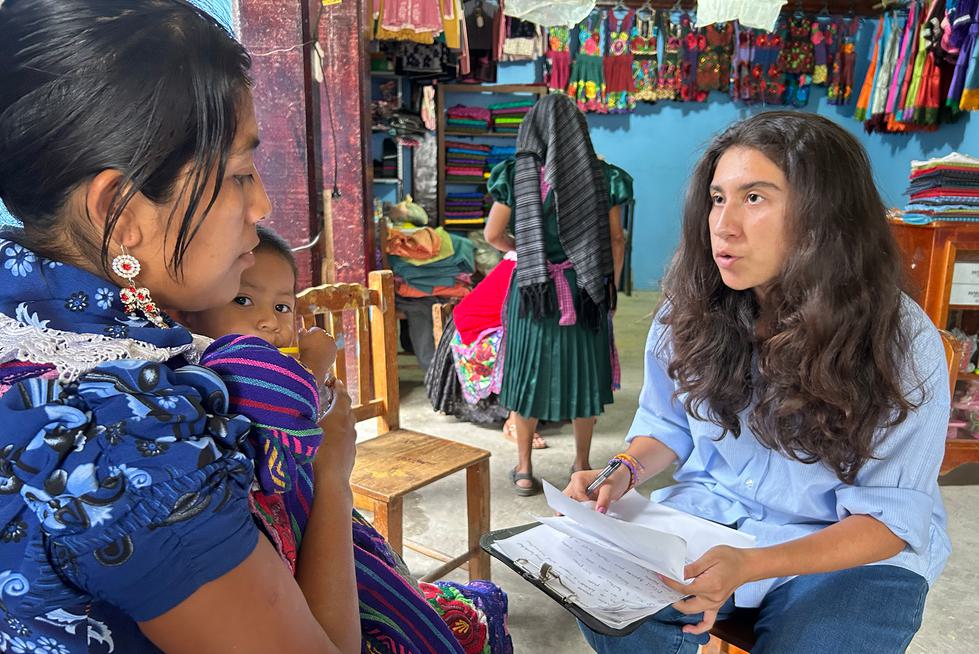 A student speaks to a woman who lives in Oaxaca Valley of Mexico.