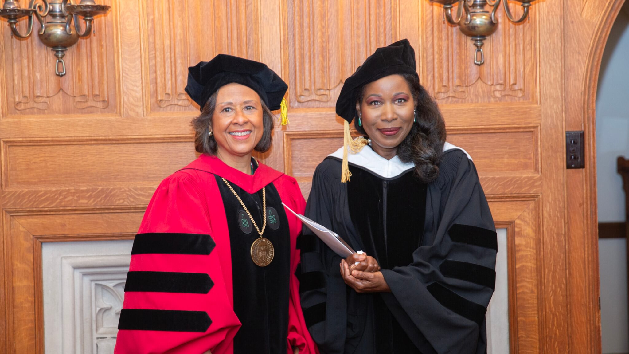 President Paula Johnson and Isabel Wilkerson pose for a photo in President Johnson’s office
