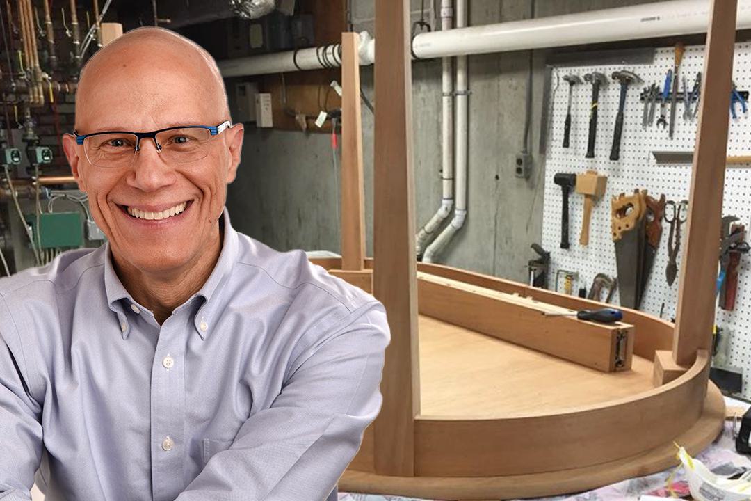 A composite photo with Professor Dan Sichel in the foreground and one of the tables he has made in the background.