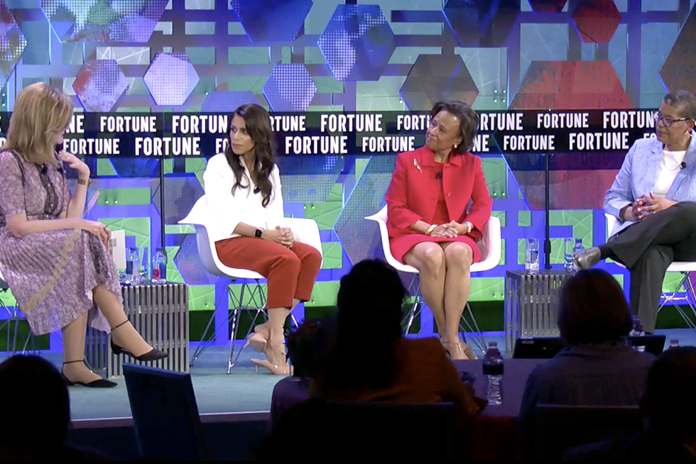 Four women on a stage including Wellesley President Paula A. Johnson.