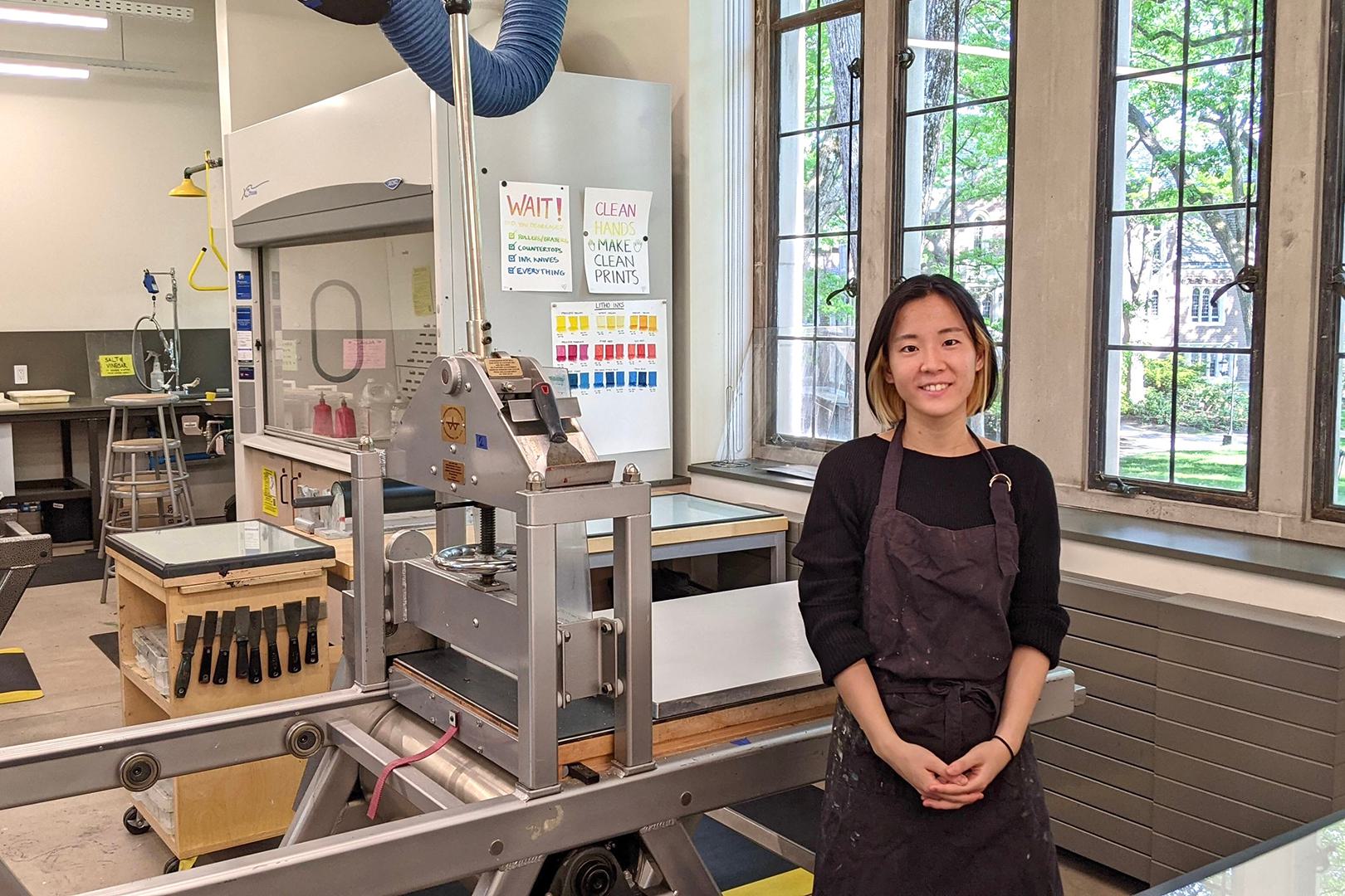 Rinako Sonobe stands in the printshop in Pendleton West