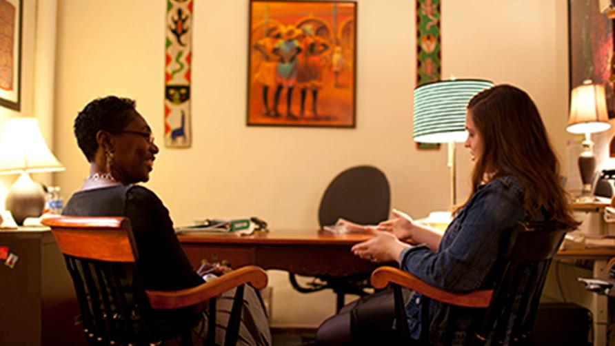 Angela C. Carpenter, Associate Professor of Cognitive and Linguistic Sciences at Wellesley College, talks with a student