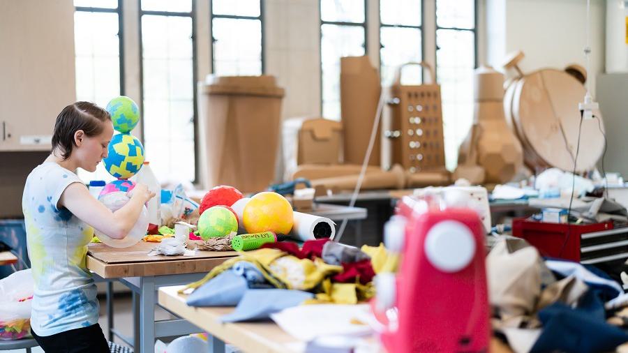 A Wellesley College student works on a mixed-media project in a new art studio within Jewetts Arts Center