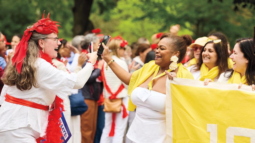 Members of the class of 1995 cheer in the alumnae parade